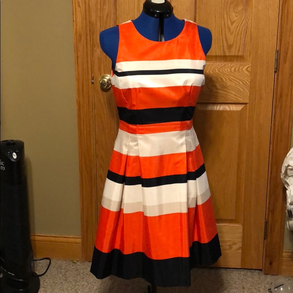 Orange, cream & black striped dress sateen finish.